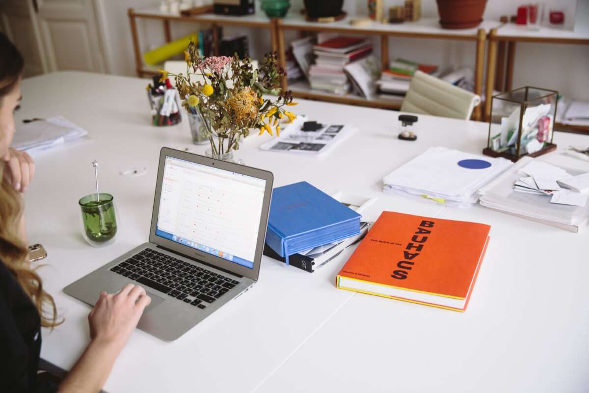 Woman working at a desk who needs the right tools for her job
