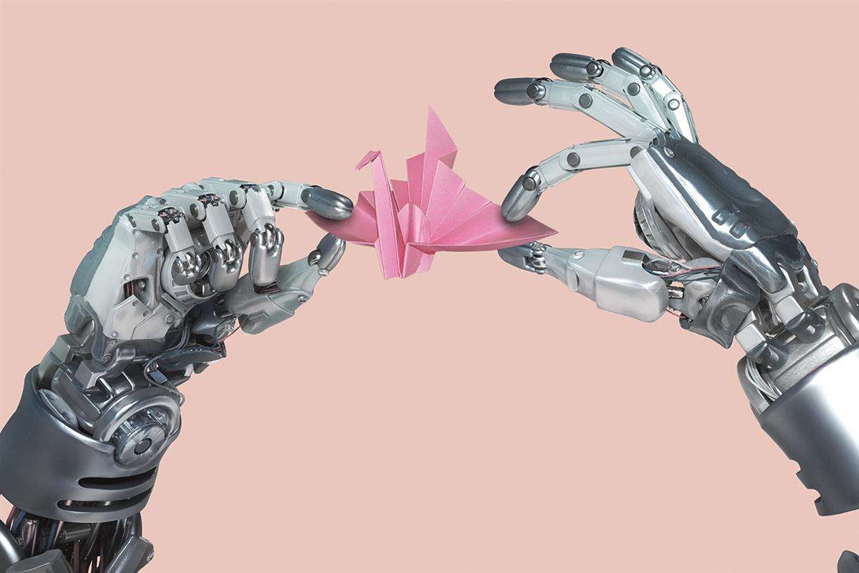 robotic AI hands creating a pink origami figure